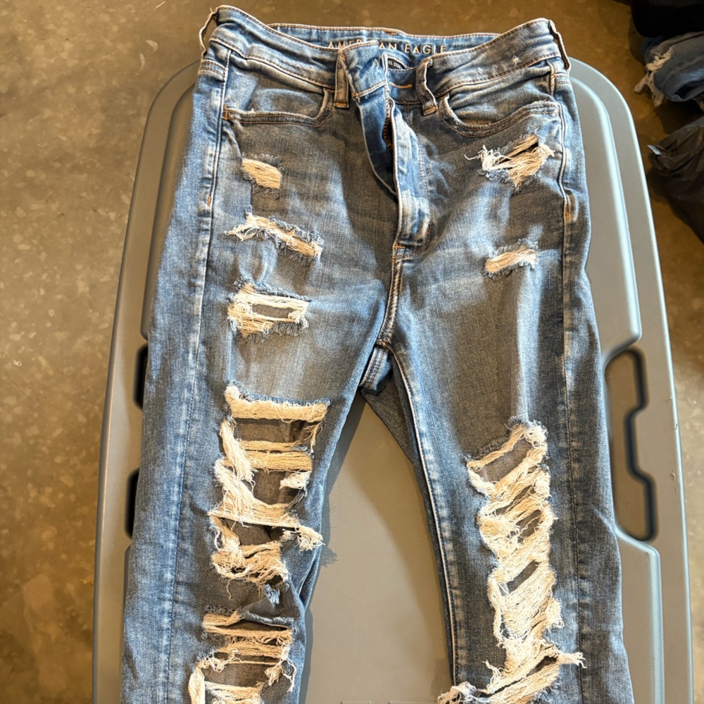 Distressed Women's Light Blue Ripped Jeans - Picture 2 of 4